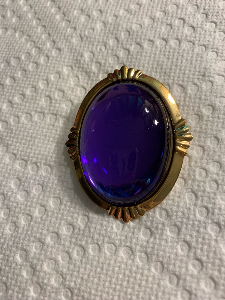 Vintage Gold-Tone Brooch With Deep Purple Cabochon